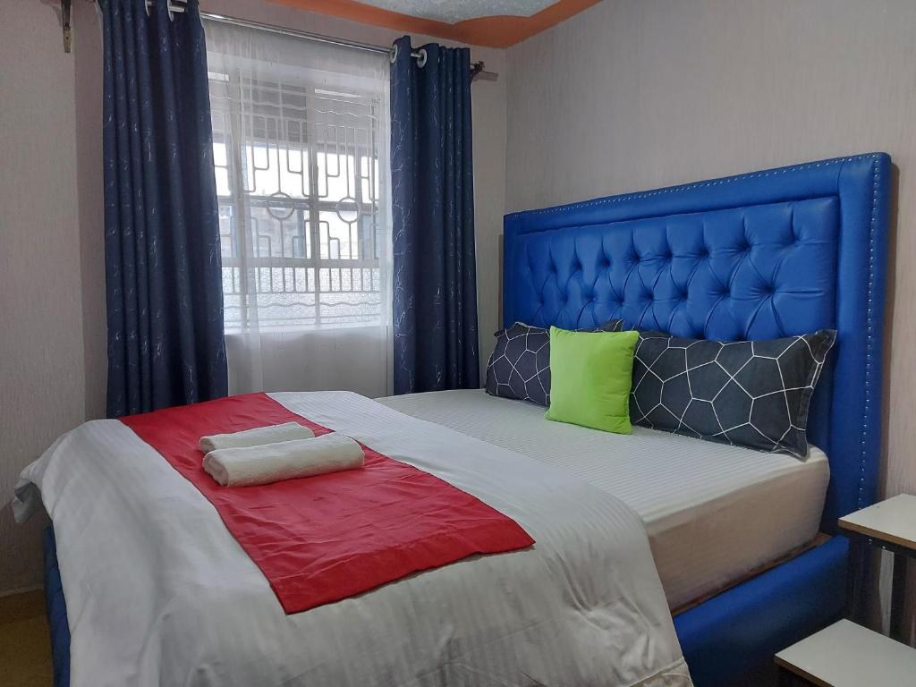 Postel nebo postele na pokoji v ubytování Parkview apartments