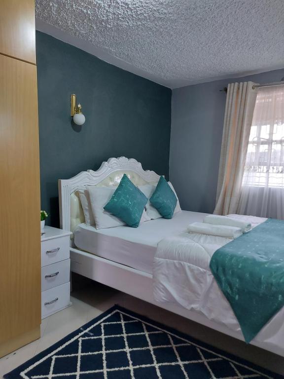 Postel nebo postele na pokoji v ubytování Parkview apartments
