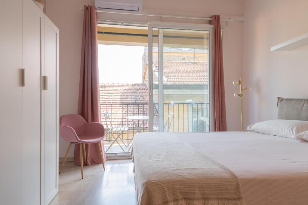 Posteľ alebo postele v izbe v ubytovaní TEODORA SUITE pink