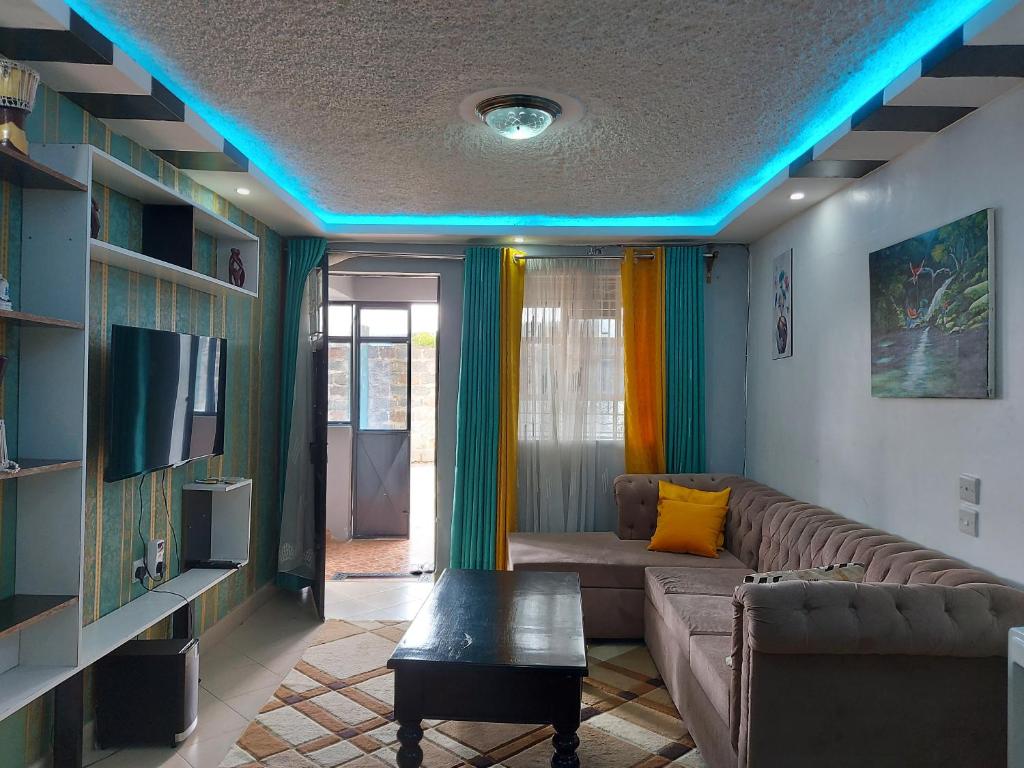 TV a/nebo společenská místnost v ubytování Parkview apartments