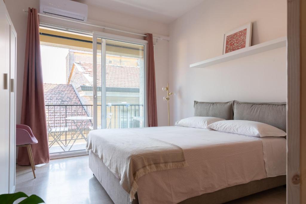 Posteľ alebo postele v izbe v ubytovaní TEODORA SUITE pink
