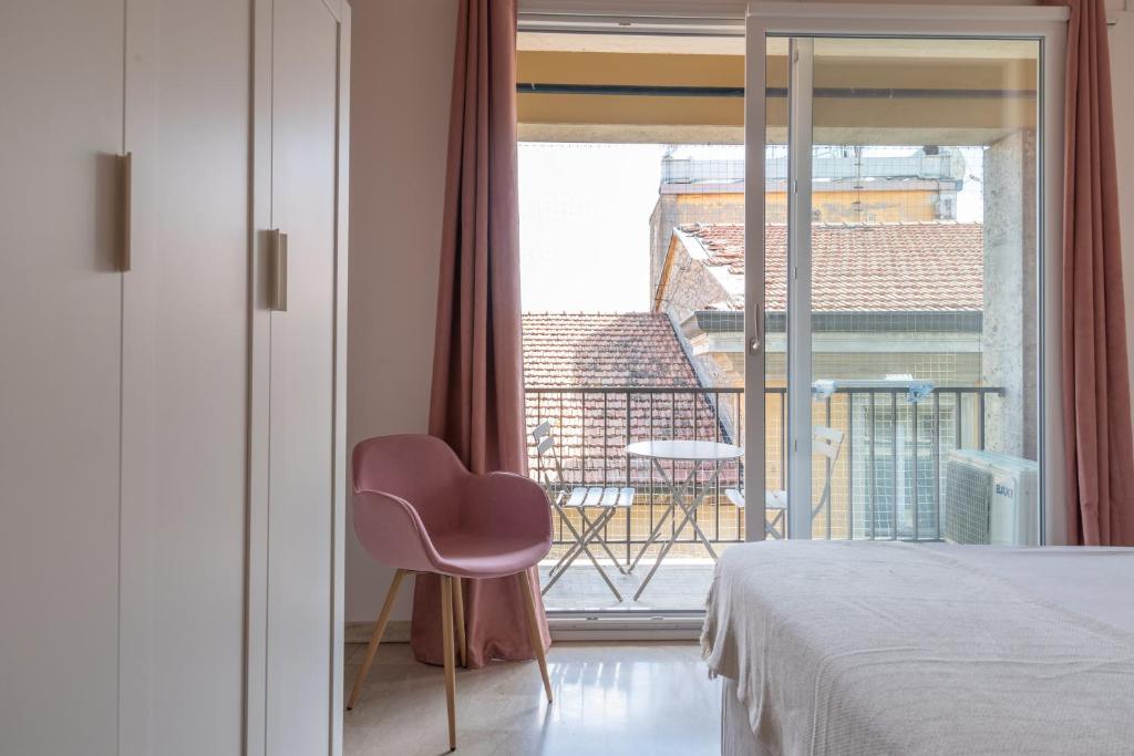 Posteľ alebo postele v izbe v ubytovaní TEODORA SUITE pink