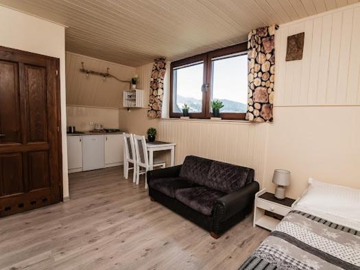 Posedenie v ubytovaní Apartamenty na wzgórzu