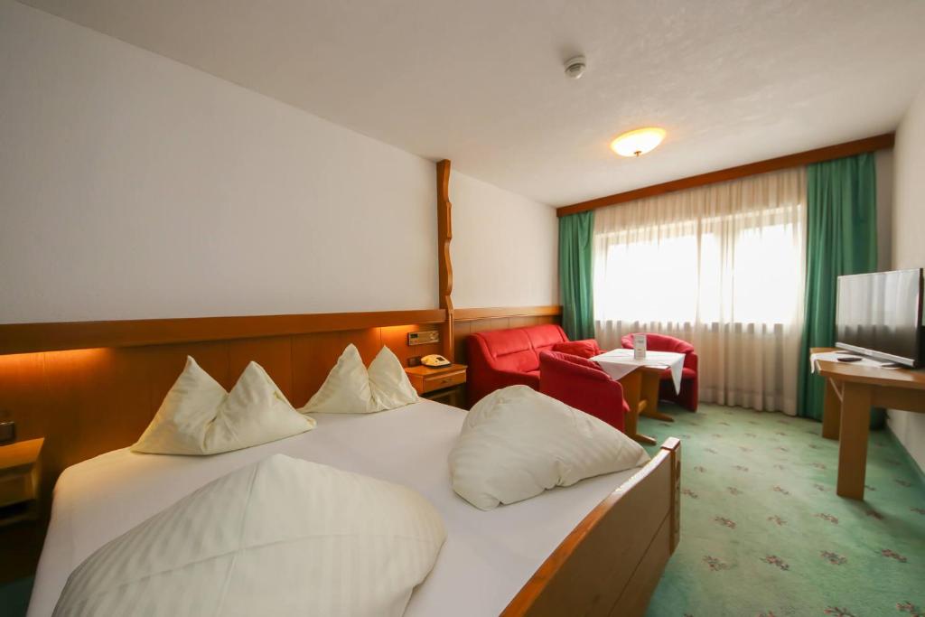 Posteľ alebo postele v izbe v ubytovaní Hotel Dax