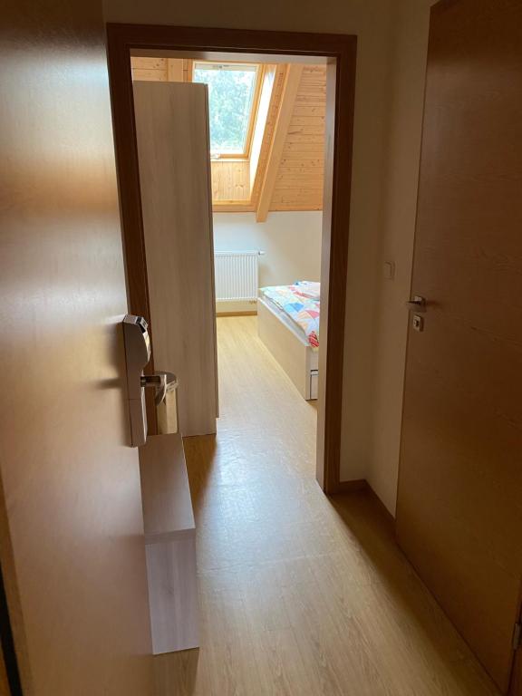 Postel nebo postele na pokoji v ubytování Penzion Ovčárna