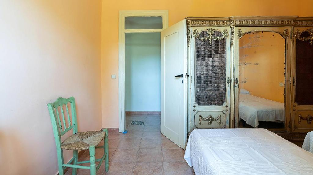 Posteľ alebo postele v izbe v ubytovaní Casa Can Roura