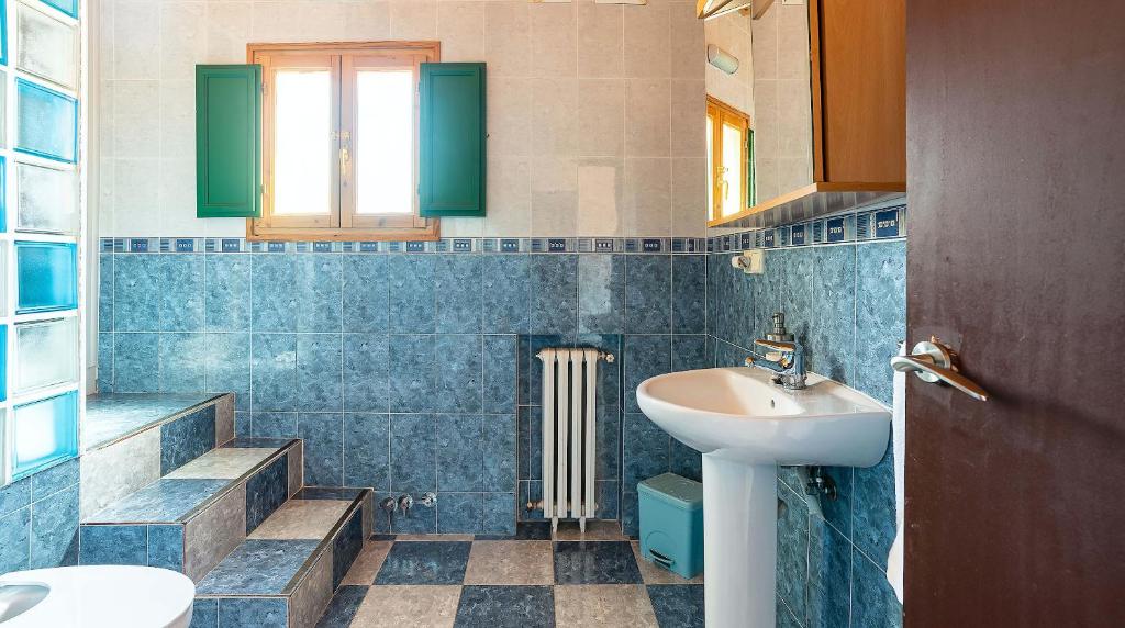 Kúpeľňa v ubytovaní Casa Can Roura
