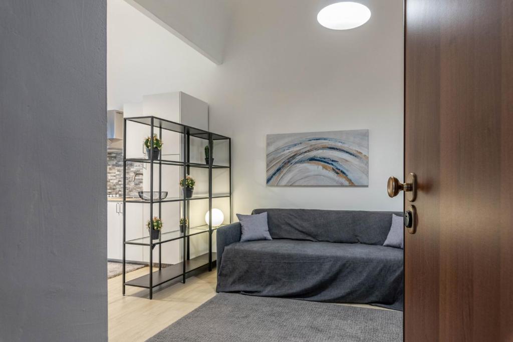 A bed or beds in a room at Al Khalisa Apartment by Wonderful Italy