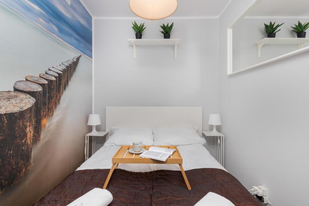 Posteľ alebo postele v izbe v ubytovaní Seaview Apartment Gdańsk Przymorze by Noclegi Renters