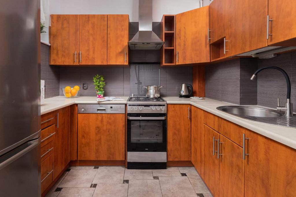 Kuchyňa alebo kuchynka v ubytovaní Seaview Apartment Gdańsk Przymorze by Noclegi Renters