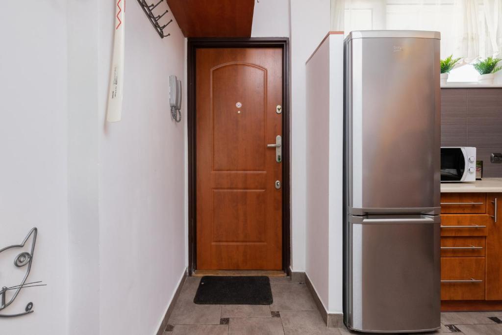Kuchyňa alebo kuchynka v ubytovaní Seaview Apartment Gdańsk Przymorze by Noclegi Renters