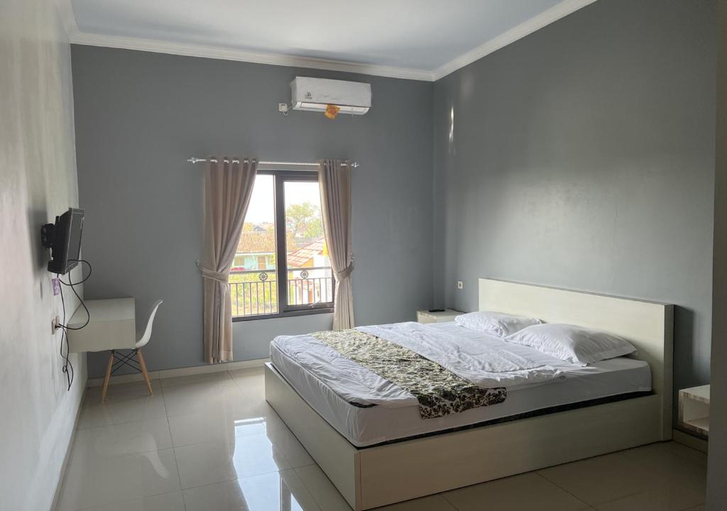 Krevet ili kreveti u jedinici u objektu Cemara Guest House Syariah Kertajati