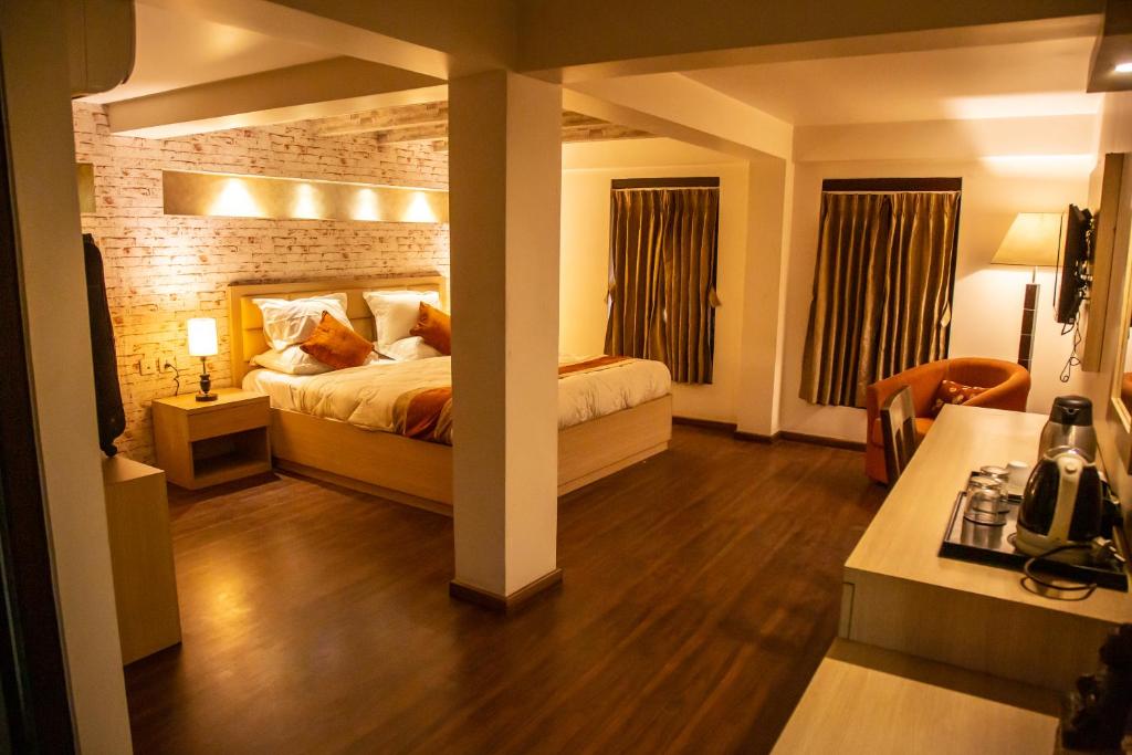 Postel nebo postele na pokoji v ubytování Hotel Traditional