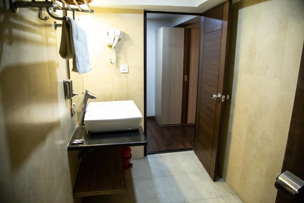 Postel nebo postele na pokoji v ubytování Hotel Traditional