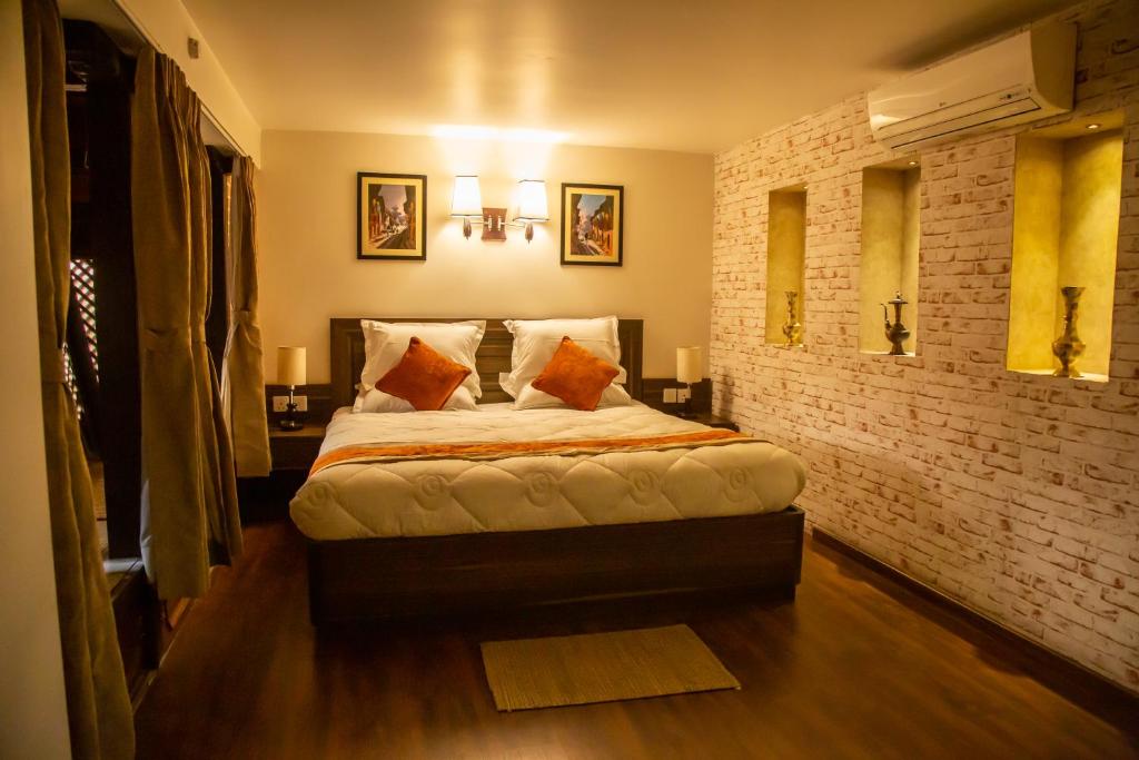 Postel nebo postele na pokoji v ubytování Hotel Traditional