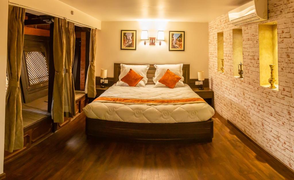 Postel nebo postele na pokoji v ubytování Hotel Traditional