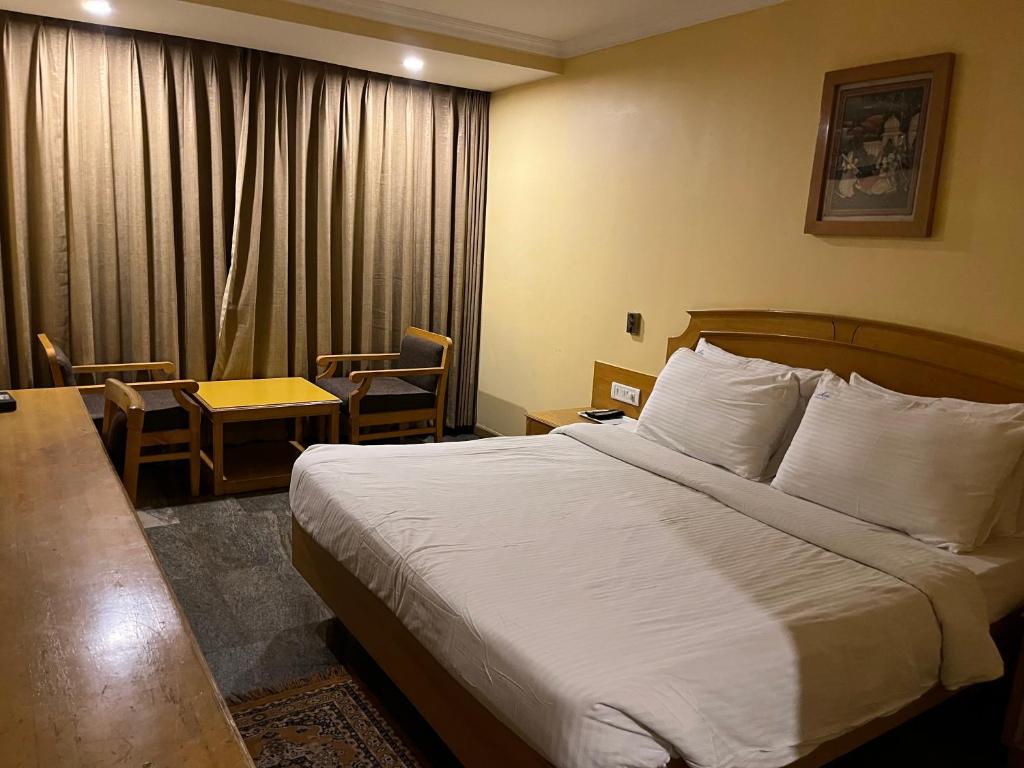 Postel nebo postele na pokoji v ubytování ASR Guesthouse