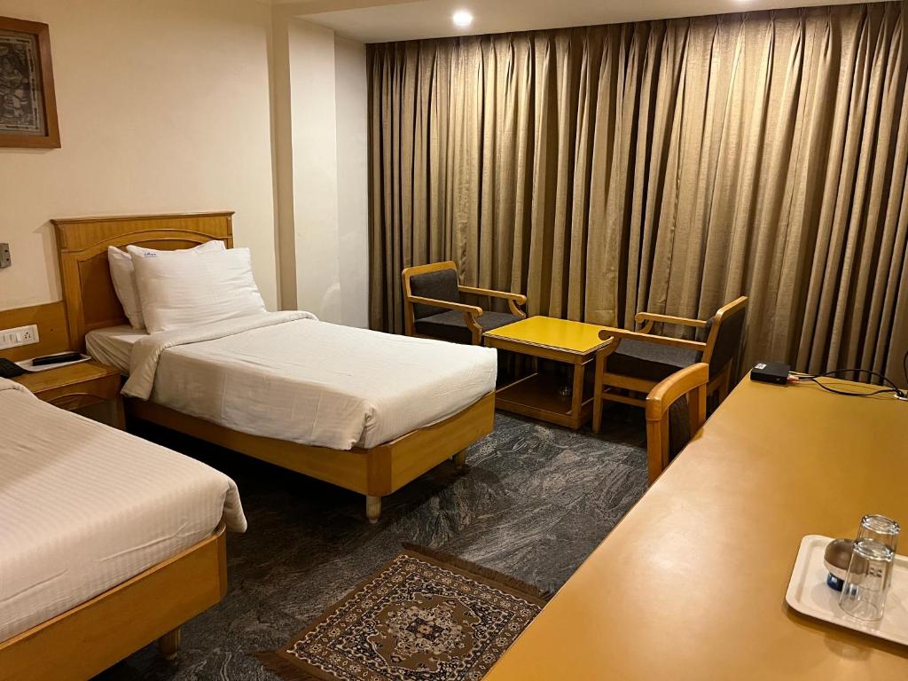 Postel nebo postele na pokoji v ubytování ASR Guesthouse