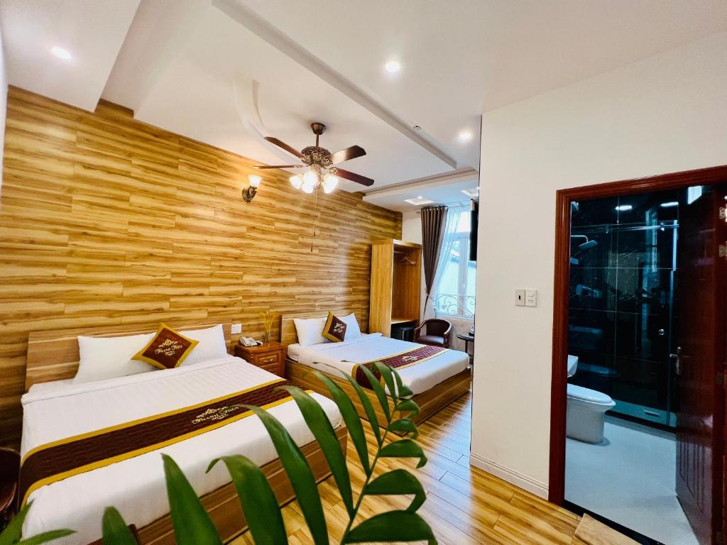 Giường trong phòng chung tại Thanh Thủy Hotel