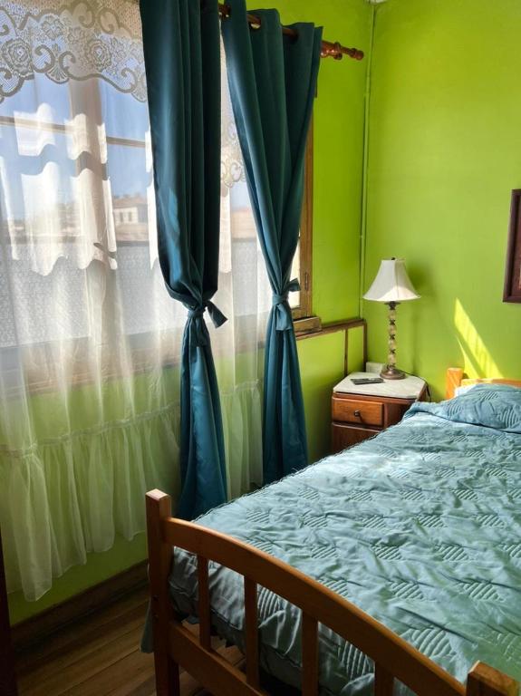Postel nebo postele na pokoji v ubytování Residencial Campo Verde