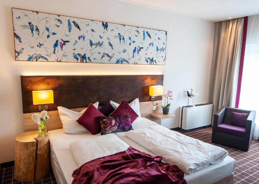 Postel nebo postele na pokoji v ubytování Business Class Hotel Ebersberg
