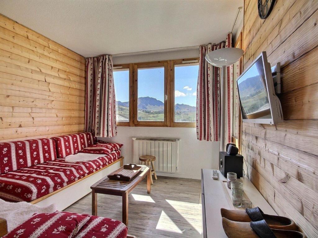 Appartement Belle Plagne, 3 pièces, 6 personnes - FR-1-455-110にあるシーティングエリア