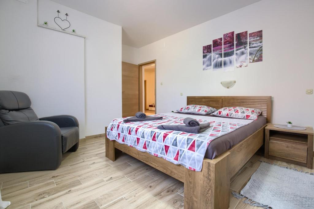 Posteľ alebo postele v izbe v ubytovaní Apartment Buddy