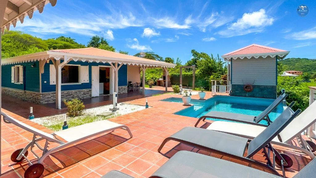 an image of a house with a swimming pool at Villa Bwa Kanpech' in Le Vauclin