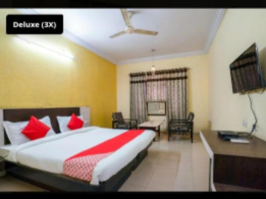 Voodi või voodid majutusasutuse Hotel Ranjit Residency toas