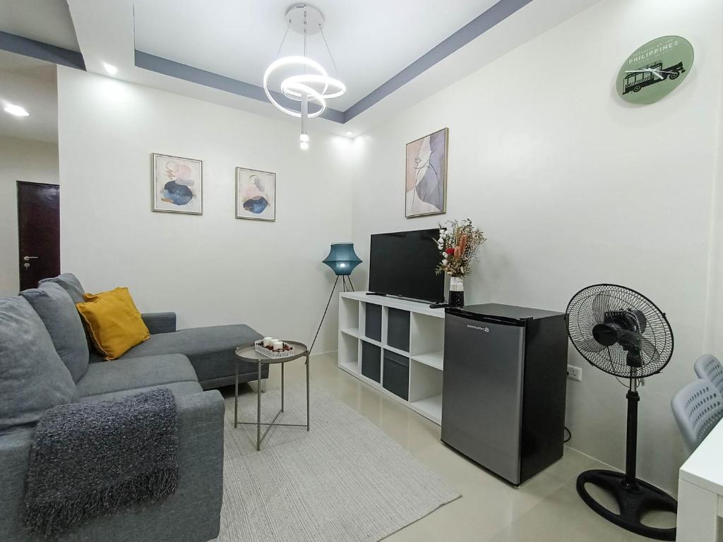 Posezení v ubytování Manzil Anilao B&B