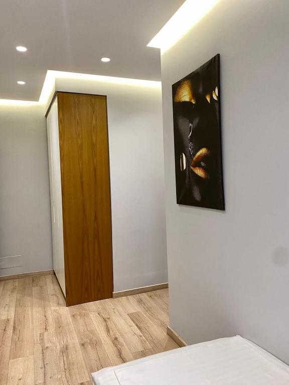 Uma cama ou camas num quarto em Primo Hotel