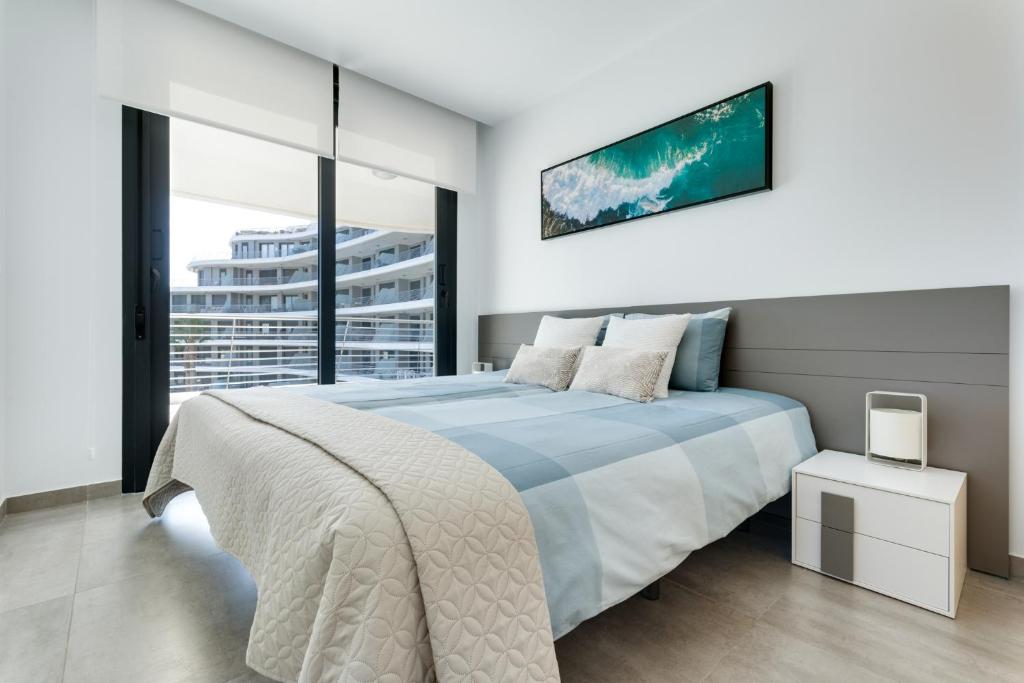 Postel nebo postele na pokoji v ubytování INFINITY View SUMMER Apartment