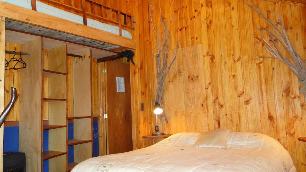 Postel nebo postele na pokoji v ubytování Lodge Colbún
