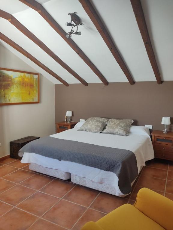 Postel nebo postele na pokoji v ubytování Maravilloso alojamiento en el centro de Baeza