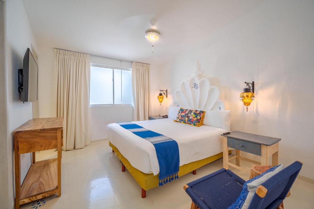 Postel nebo postele na pokoji v ubytování Mar del Cabo By Velas Resorts Adults Only