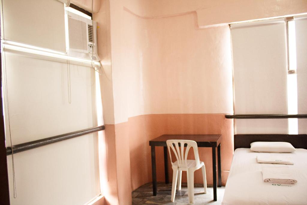 Postel nebo postele na pokoji v ubytování GV Hotel - Ormoc