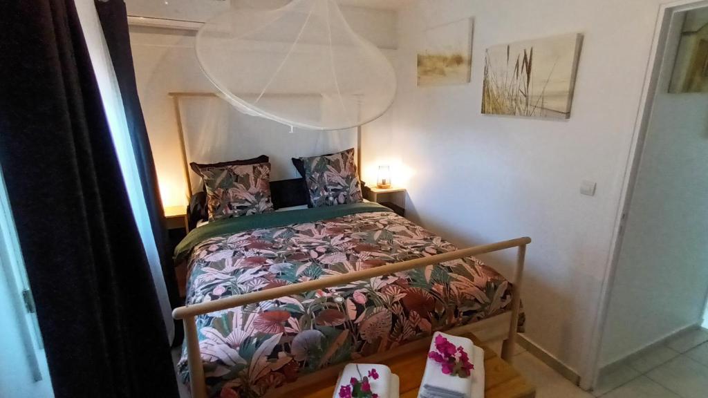 Postel nebo postele na pokoji v ubytování Love Guadeloupe