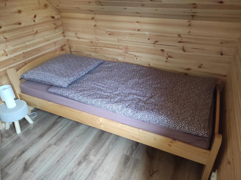 Postel nebo postele na pokoji v ubytování Domek na Blejchu