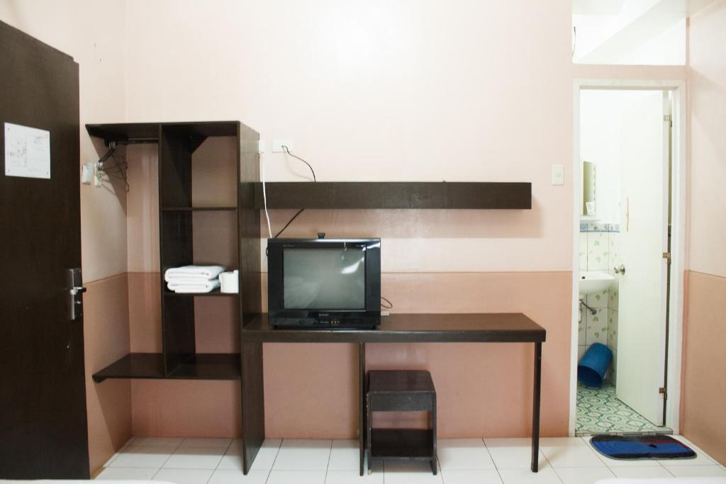 TV a/nebo společenská místnost v ubytování GV Hotel - Naval