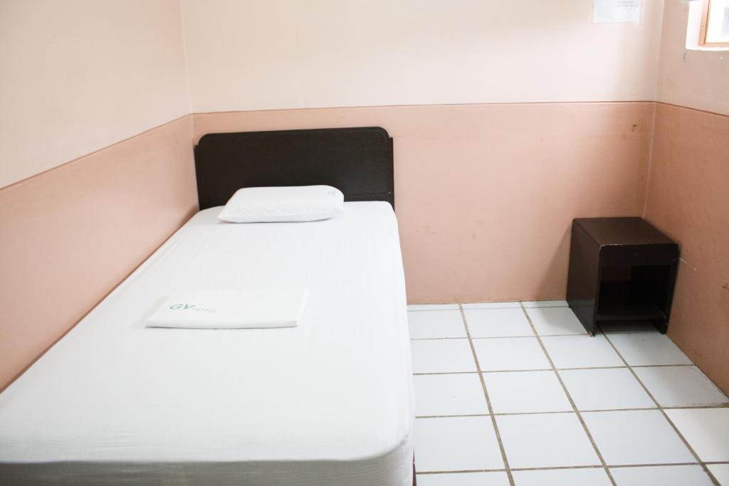 Postel nebo postele na pokoji v ubytování GV Hotel - Naval