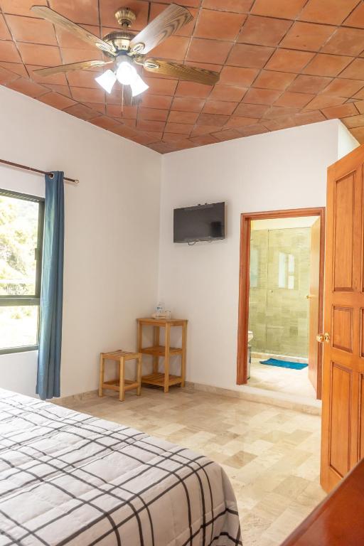 Postel nebo postele na pokoji v ubytování CASA ANTARES