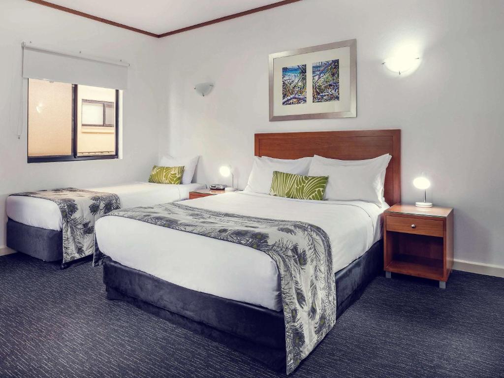 Postel nebo postele na pokoji v ubytování Mercure Darwin Airport Resort