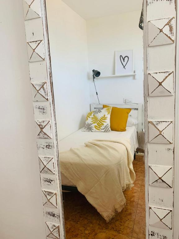 Posteľ alebo postele v izbe v ubytovaní Charming & cosy beach apartment