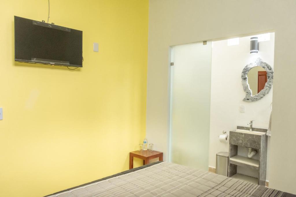 TV a/nebo společenská místnost v ubytování CASA ANTARES