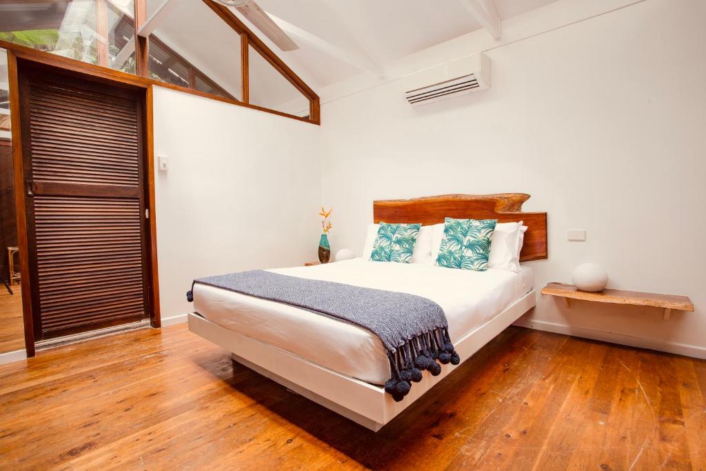 Postel nebo postele na pokoji v ubytování Daintree Wilderness Lodge