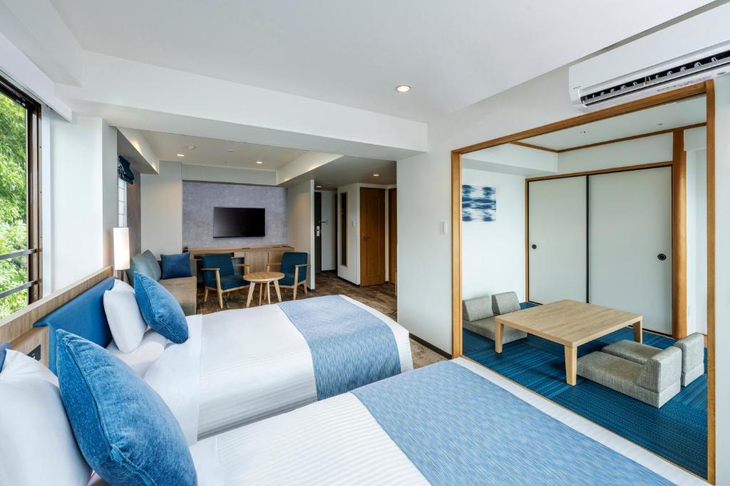 TV a/nebo společenská místnost v ubytování Atagawa Ocean Resort