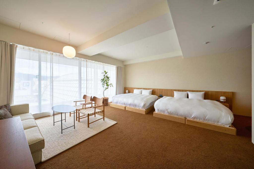 Postel nebo postele na pokoji v ubytování Hotel Lepo Chahal