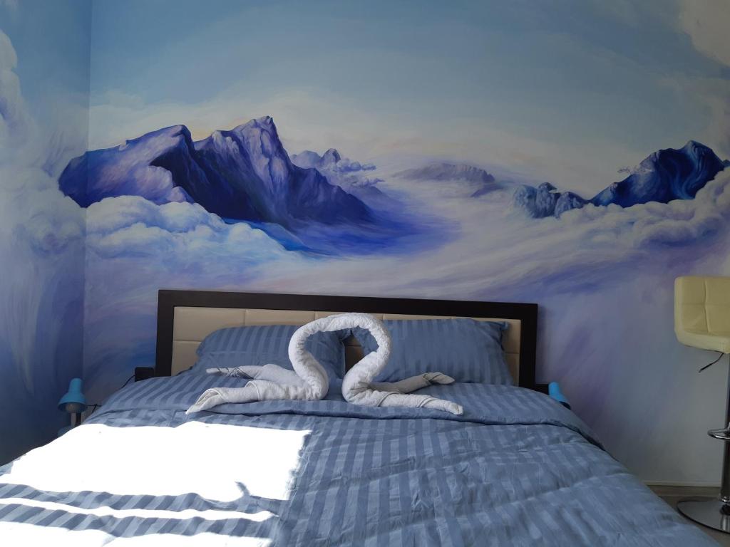 Postel nebo postele na pokoji v ubytování Mountain Dreams - 104HotelUri