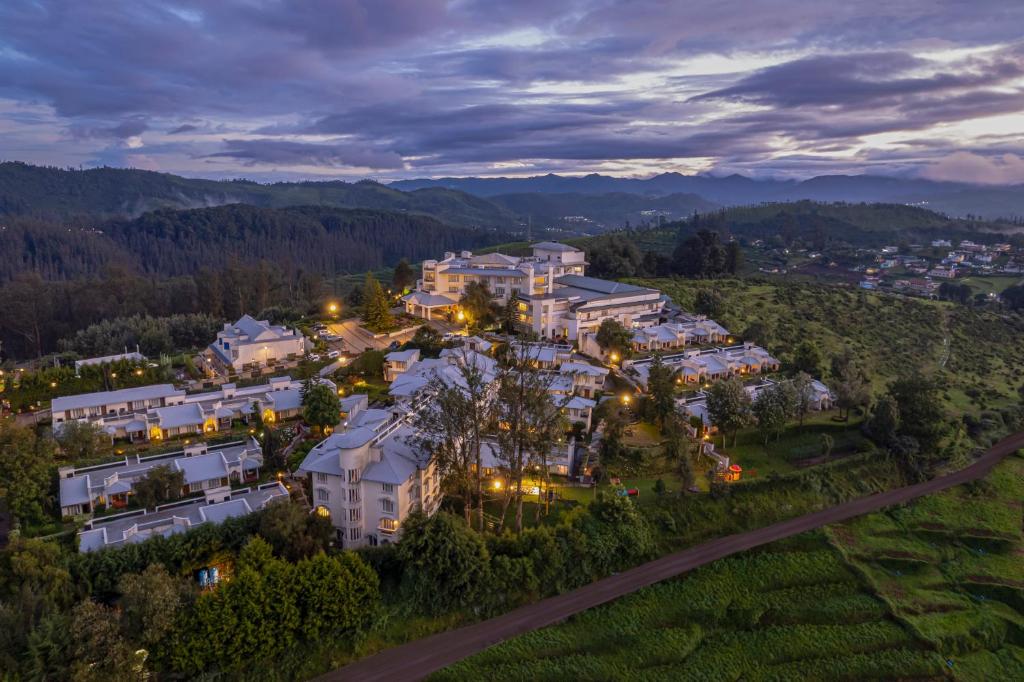 an aerial view of a large house on a hill at Sterling Ooty Fern Hill in Ooty