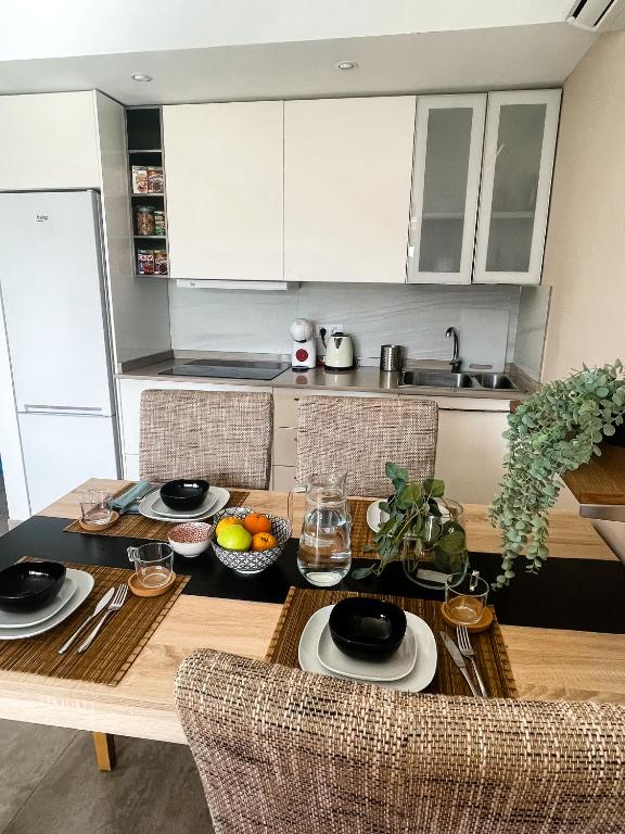 Kuchyň nebo kuchyňský kout v ubytování Rosa Amarilla Apartment